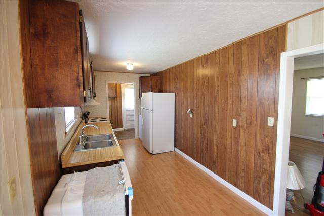 90 Winnie Boynton Road Manchester, TN 37355 - Photo 8 of 20 a view of a storage & utility room with a sink