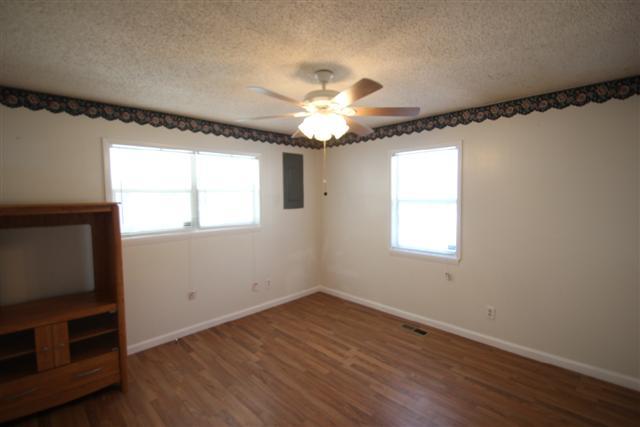 90 Winnie Boynton Road Manchester, TN 37355 - Photo 10 of 20 a very nice looking room with wooden floor and a window