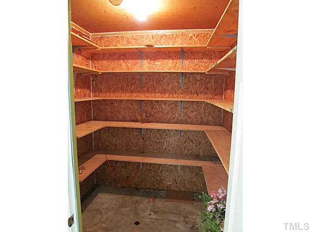 5908 Spring Valley Drive Raleigh, NC 27616 - Photo 8 of 25 Large storage closet off the sunroom