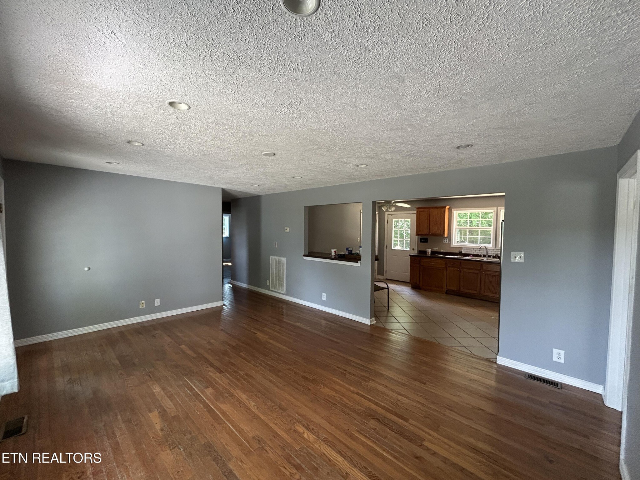 2702 Baseline Road Jamestown, TN 38556 - Photo 12 of 22 a view of empty room with wooden floor
