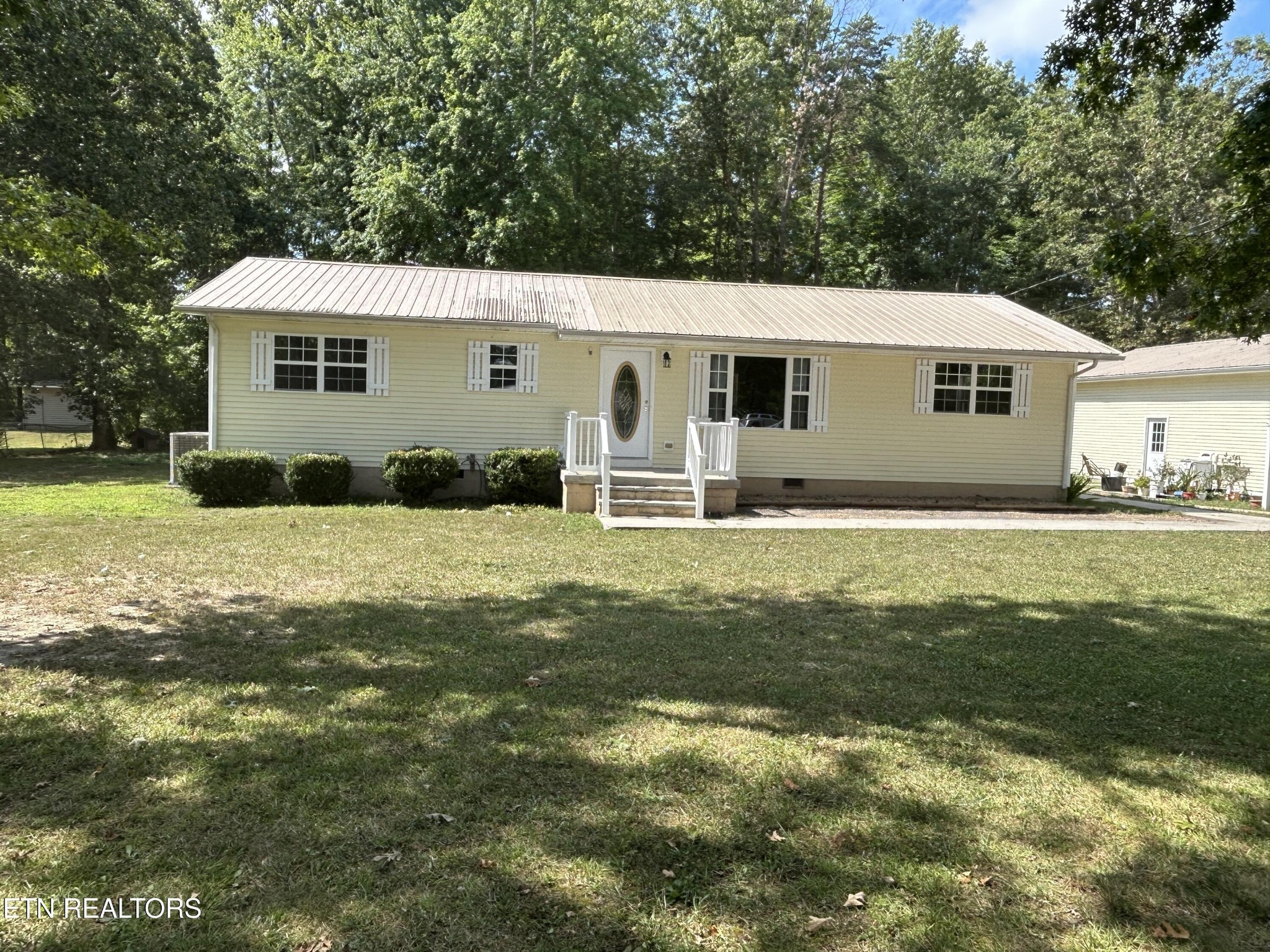 2702 Baseline Road Jamestown, TN 38556 - Photo 3 of 22 a house view with a garden space