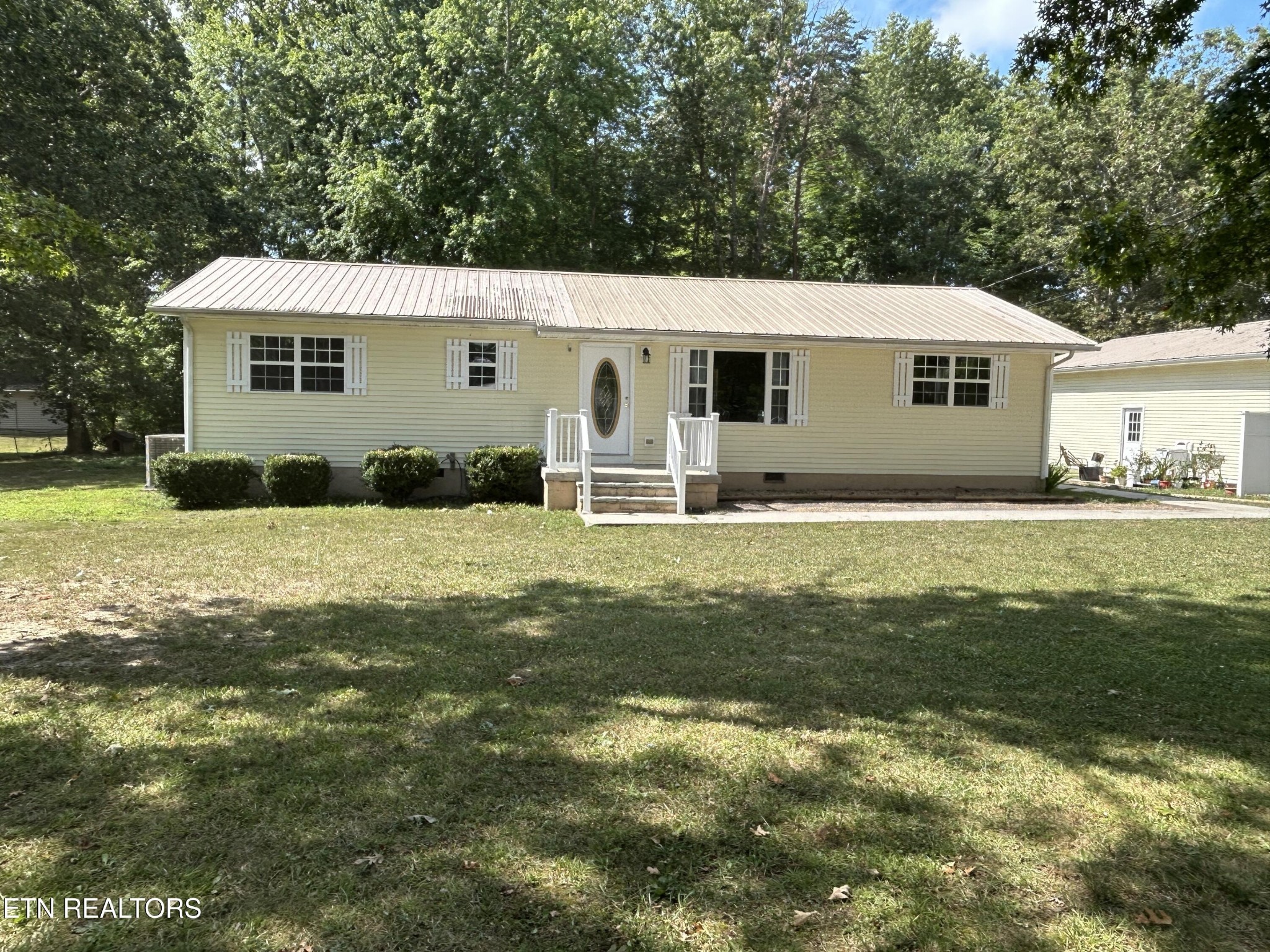 2702 Baseline Road Jamestown, TN 38556 - Photo 4 of 22 a view of a house with a yard