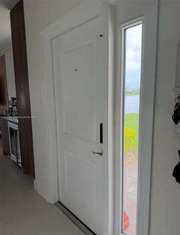 a bathroom with a tub and shower