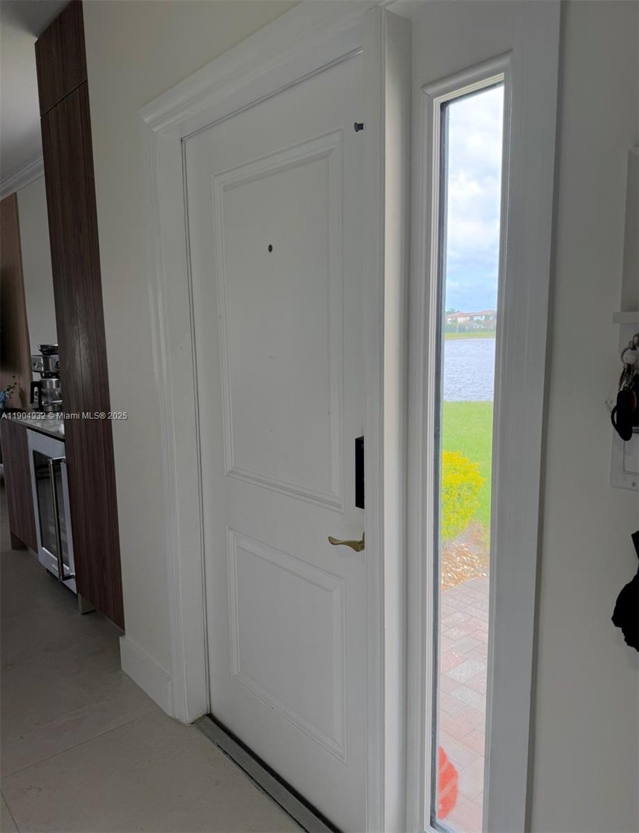 481 Northeast 194th Terrace, Unit 481 Miami, FL 33179 - Photo 20 of 23 a bathroom with a tub and shower