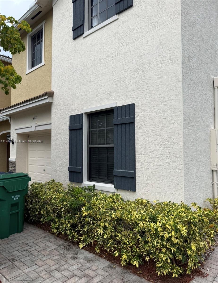 481 Northeast 194th Terrace, Unit 481 Miami, FL 33179 - Photo 22 of 23 front view of a house