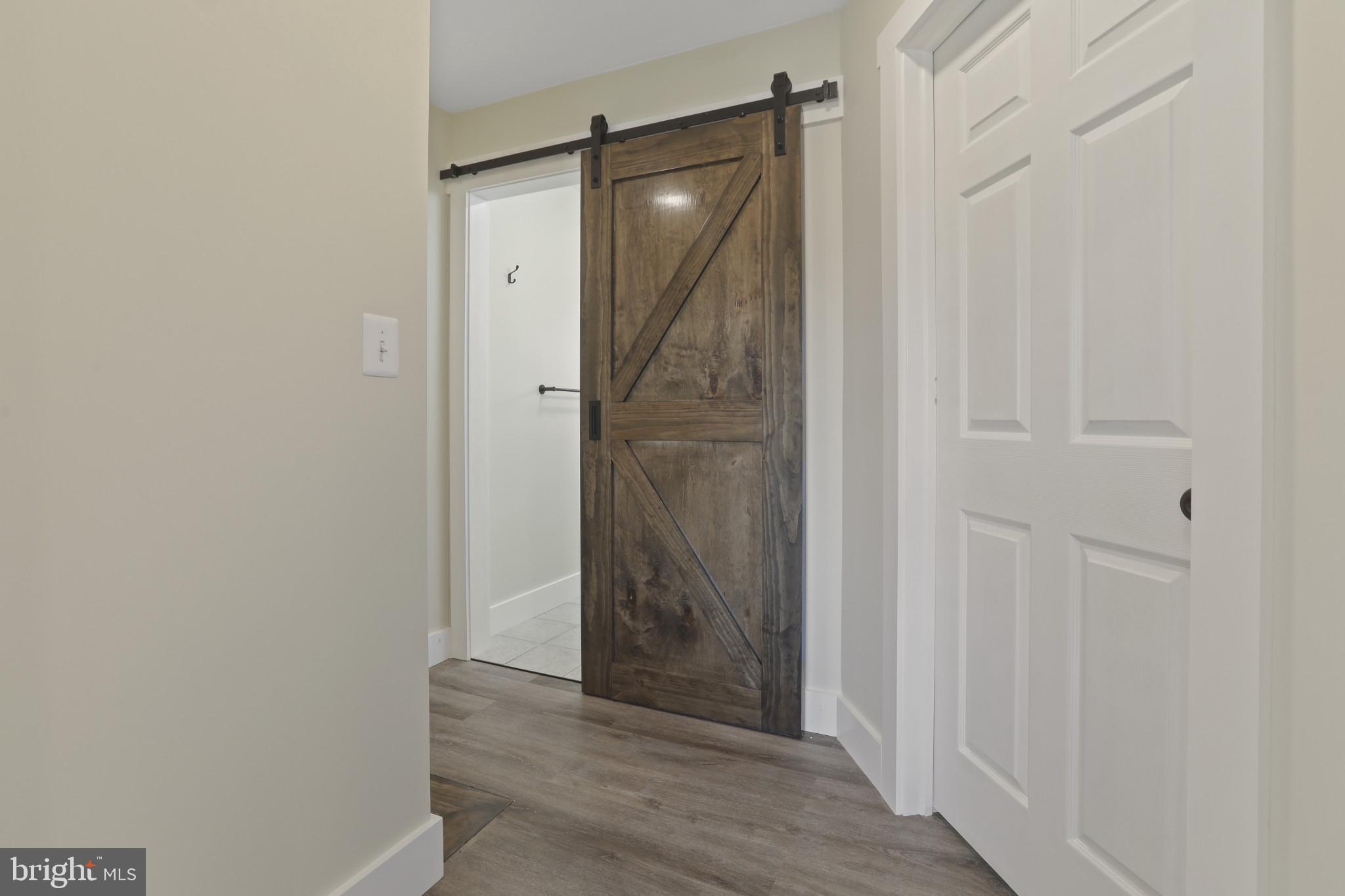 3828 10th Street Baltimore, MD 21225 - Photo 14 of 27 a view of a bathroom from a hallway