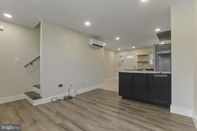 a view of kitchen with wooden floor