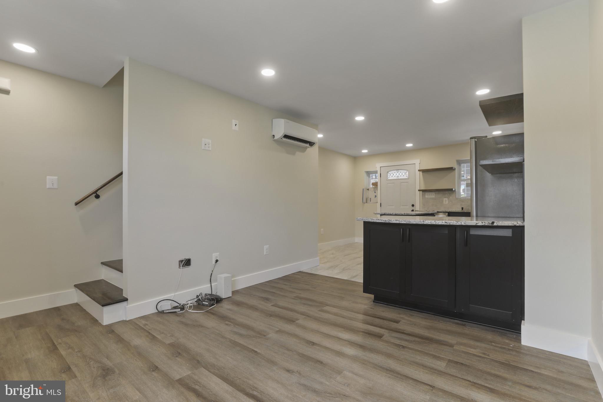 3828 10th Street Baltimore, MD 21225 - Photo 3 of 27 a view of kitchen with wooden floor