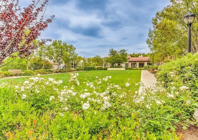a view of a street with a building in the background