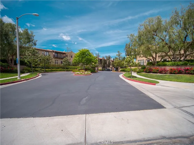 a view of a street with houses