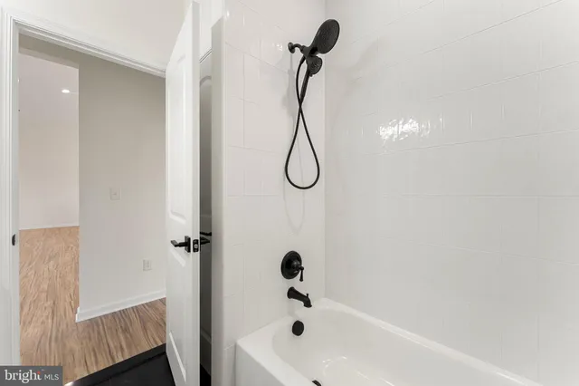 an empty room with wooden floor