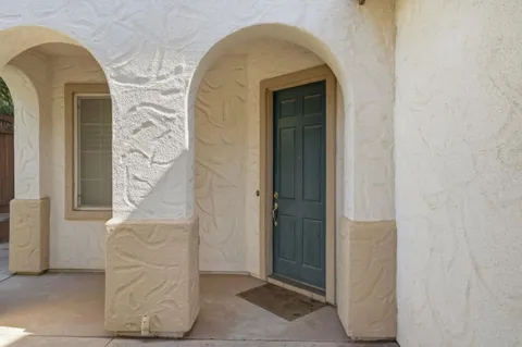 a view of entrance door of a house
