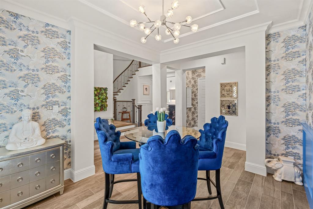 1616 Prairie Ridge Road Fort Worth, TX 76008 - Photo 13 of 40 a view of a dining room with furniture window and wooden floor