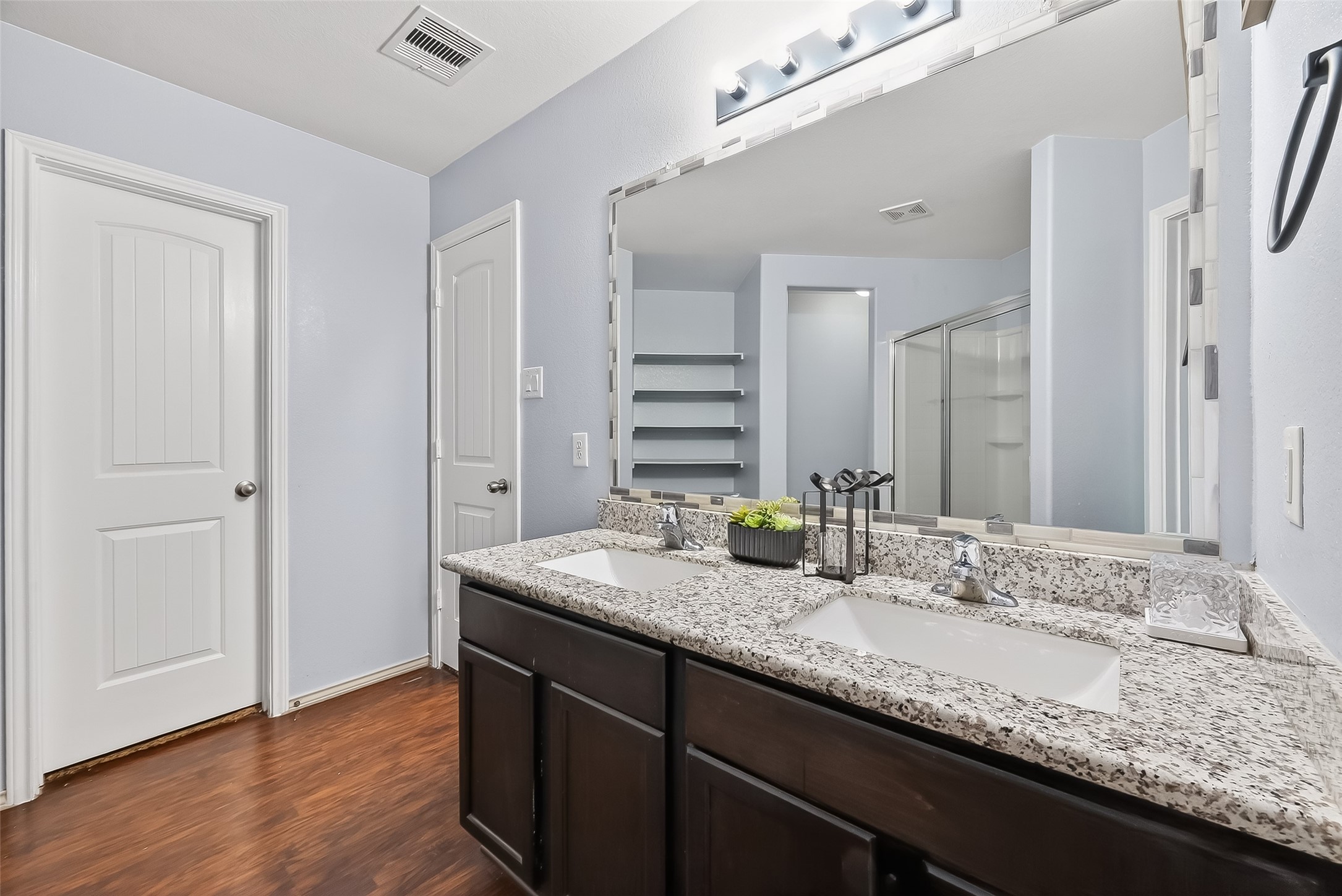 20426 Sweet Louetta Lane Spring, TX 77388 - Photo 17 of 20 a bathroom with a granite countertop sink and a mirror
