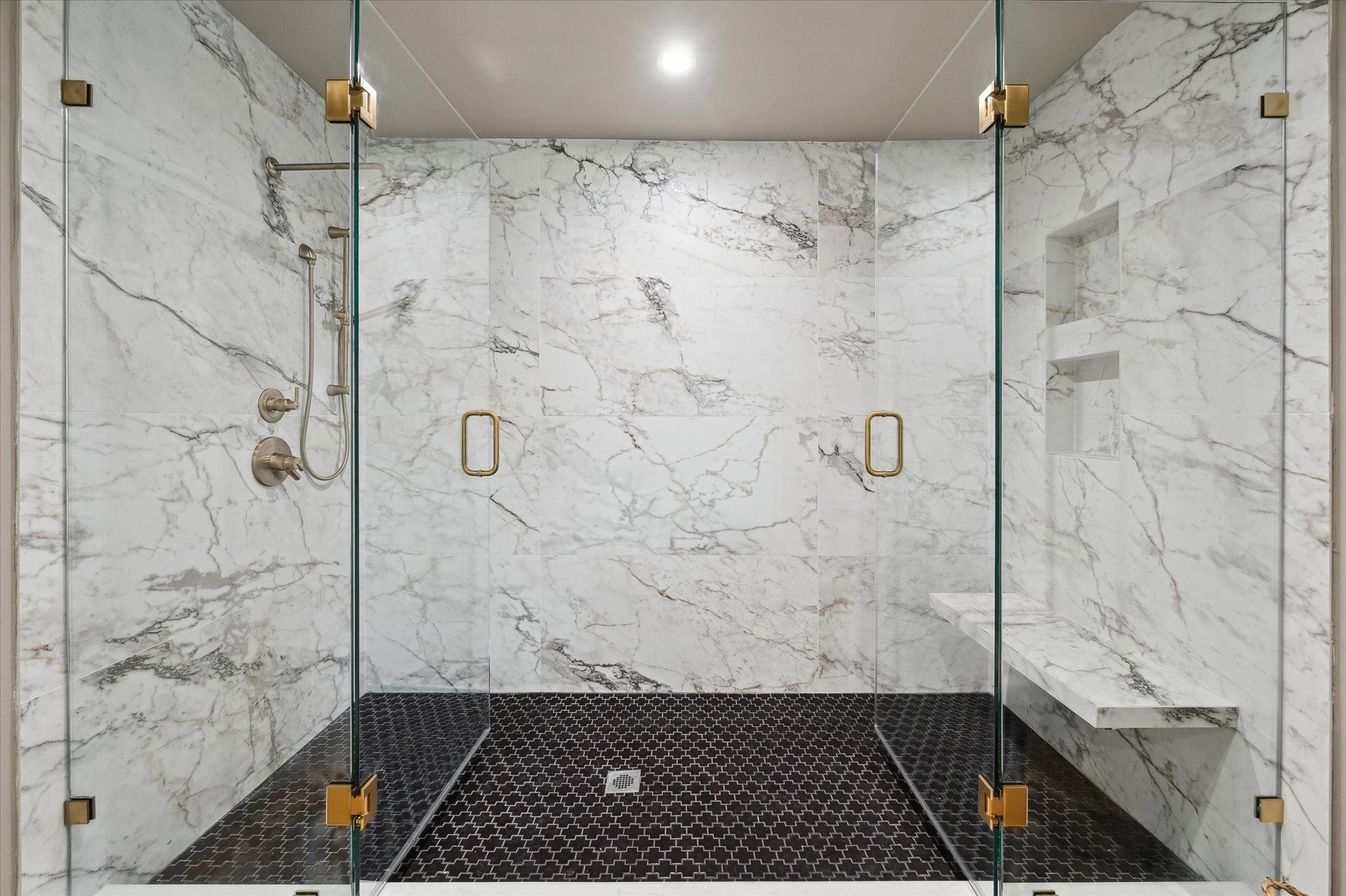 10402 Raritan Drive Houston, TX 77043 - Photo 16 of 27 a bathroom with a shower