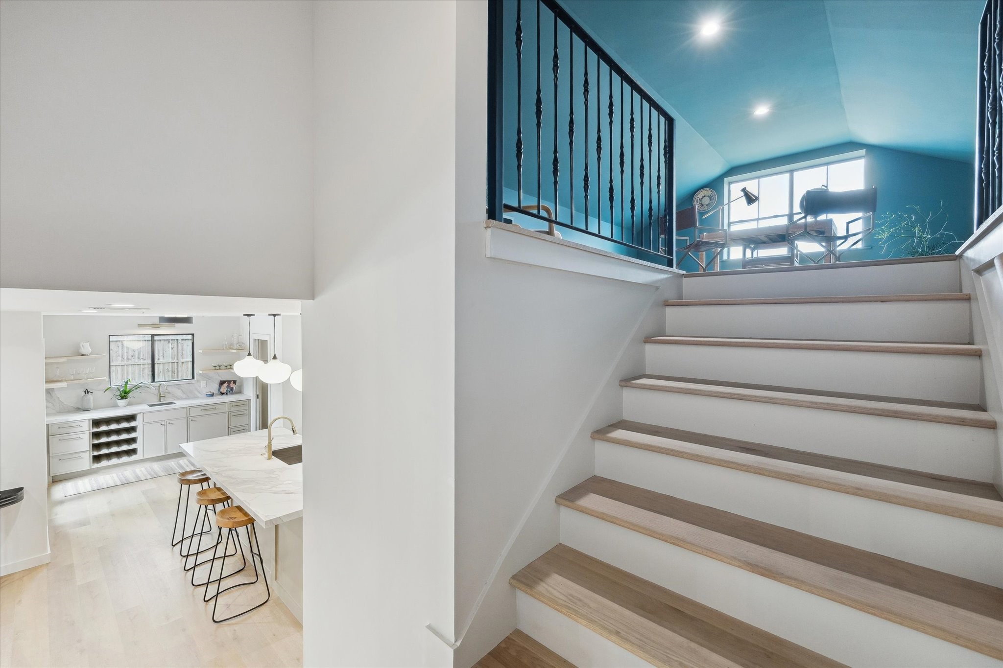 10402 Raritan Drive Houston, TX 77043 - Photo 18 of 27 a view of entryway and hall with wooden floor