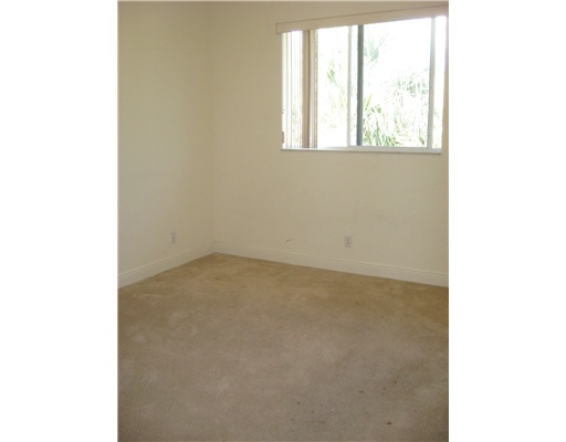 4262 Coventry Pointe Way Lake Worth, FL 33461 - Photo 10 of 12 a view of a room that has a window in it