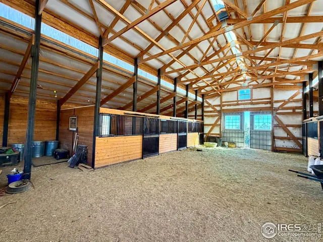 a view of a house with a snow in the yard