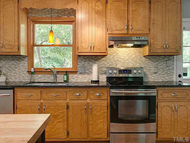 5229 Guess Road Durham, NC 27712 - Photo 12 of 25 Kitchen has a great layout and access to the back deck. Kitchen