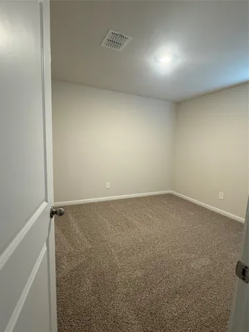 an empty room with a workbench