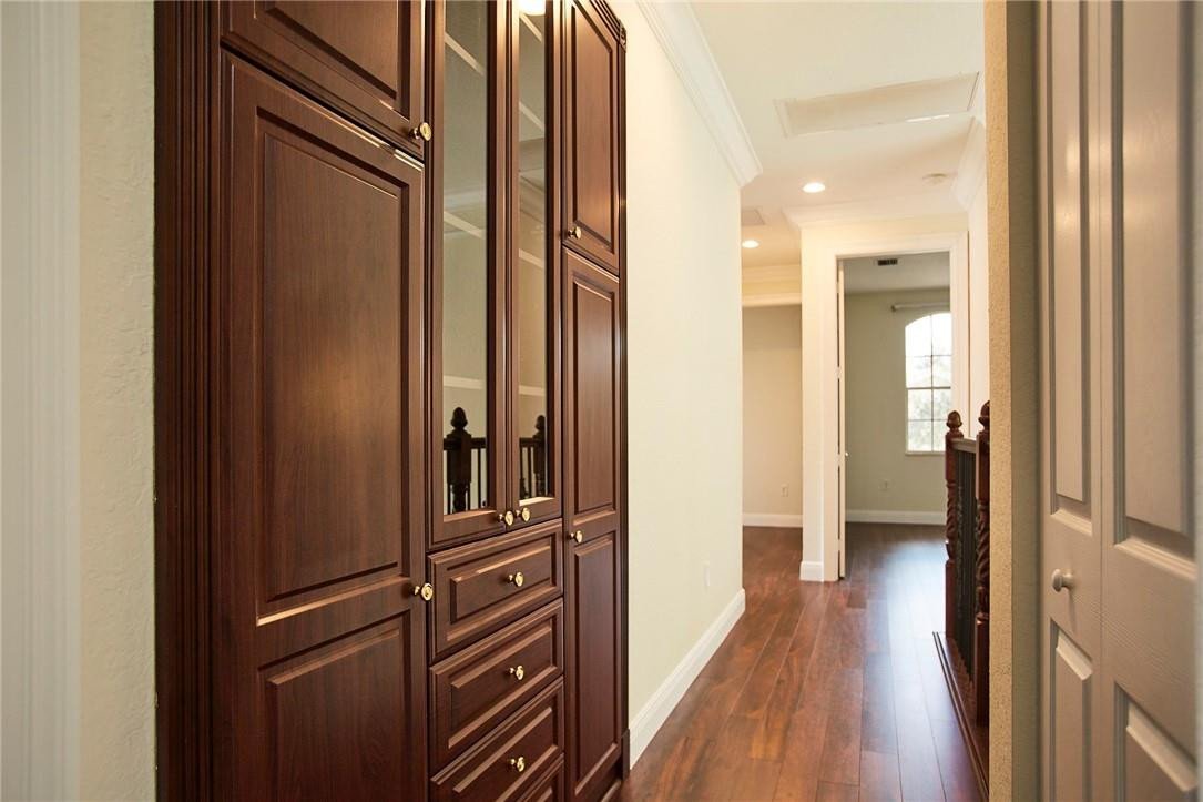 11110 Misty Ridge Way Boynton Beach, FL 33473 - Photo 18 of 32 Upstairs hallway with custom built-in