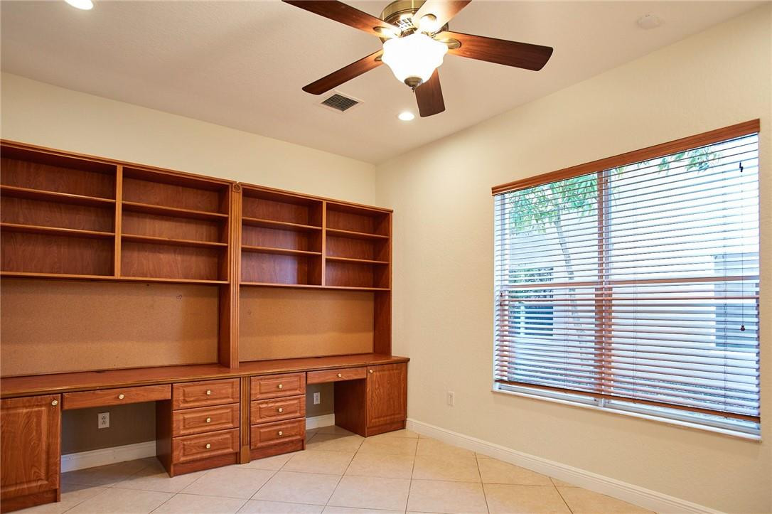 11110 Misty Ridge Way Boynton Beach, FL 33473 - Photo 10 of 32 Downstairs bedroom with custom wall unit
