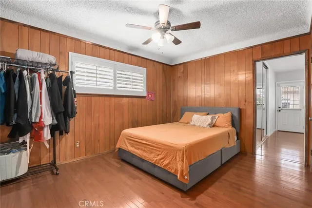 a bedroom with a bed and a walk in closet