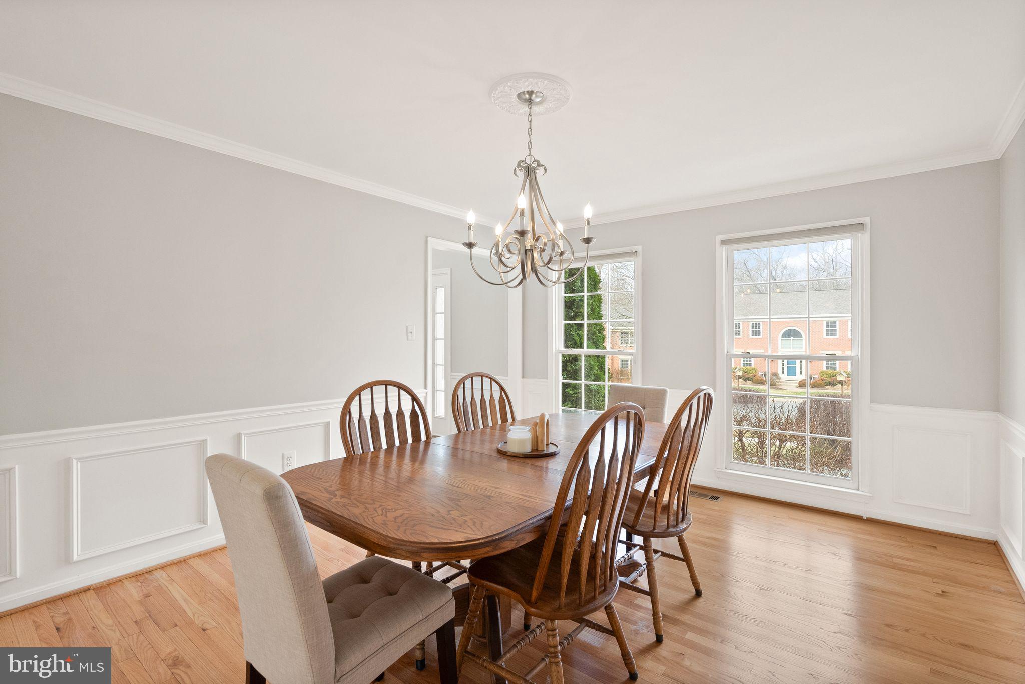 6833 Compton Heights Circle Clifton, VA 20124 - Photo 13 of 81 a view of a dining room with furniture window and wooden floor