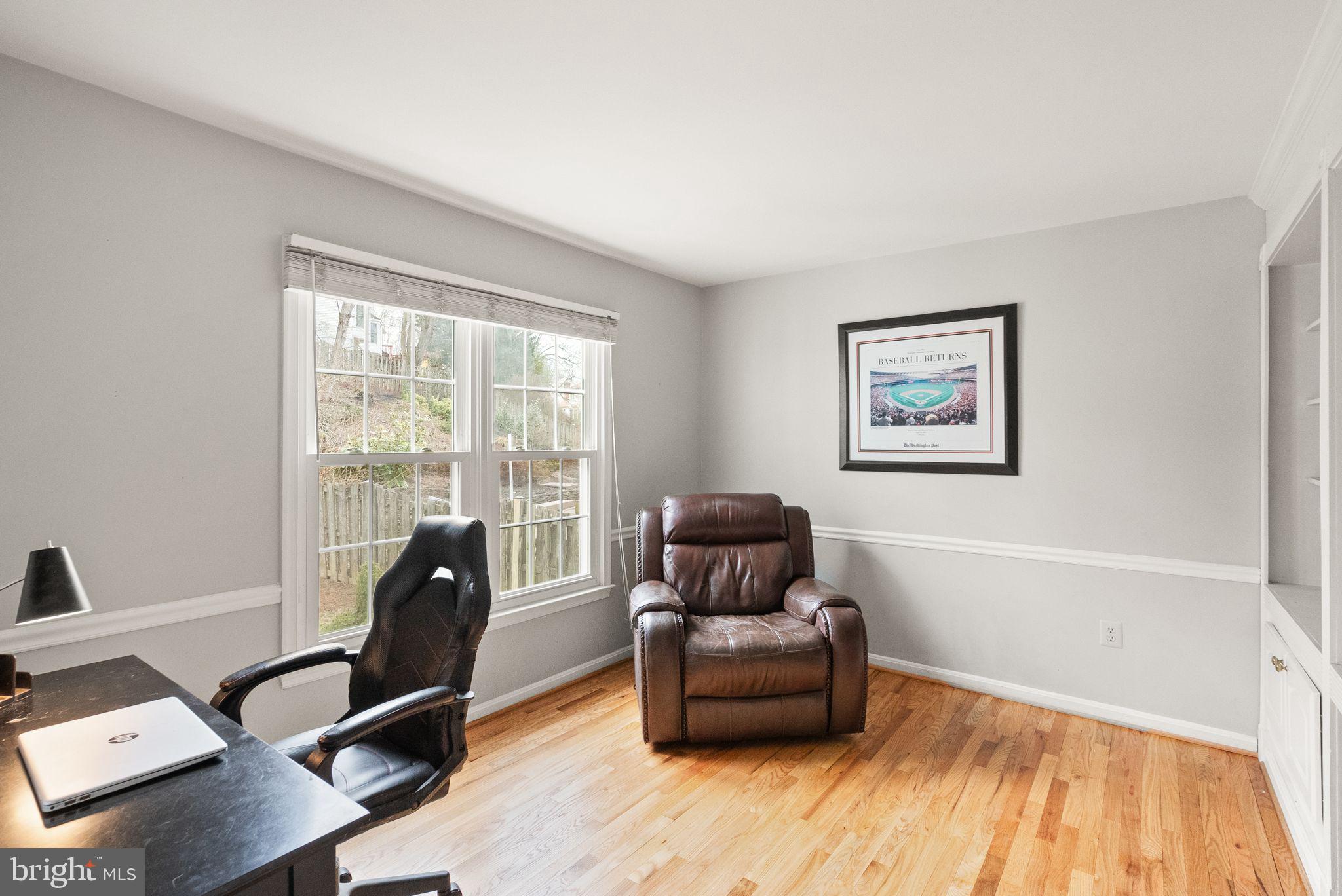 6833 Compton Heights Circle Clifton, VA 20124 - Photo 27 of 81 a living room with furniture and a window