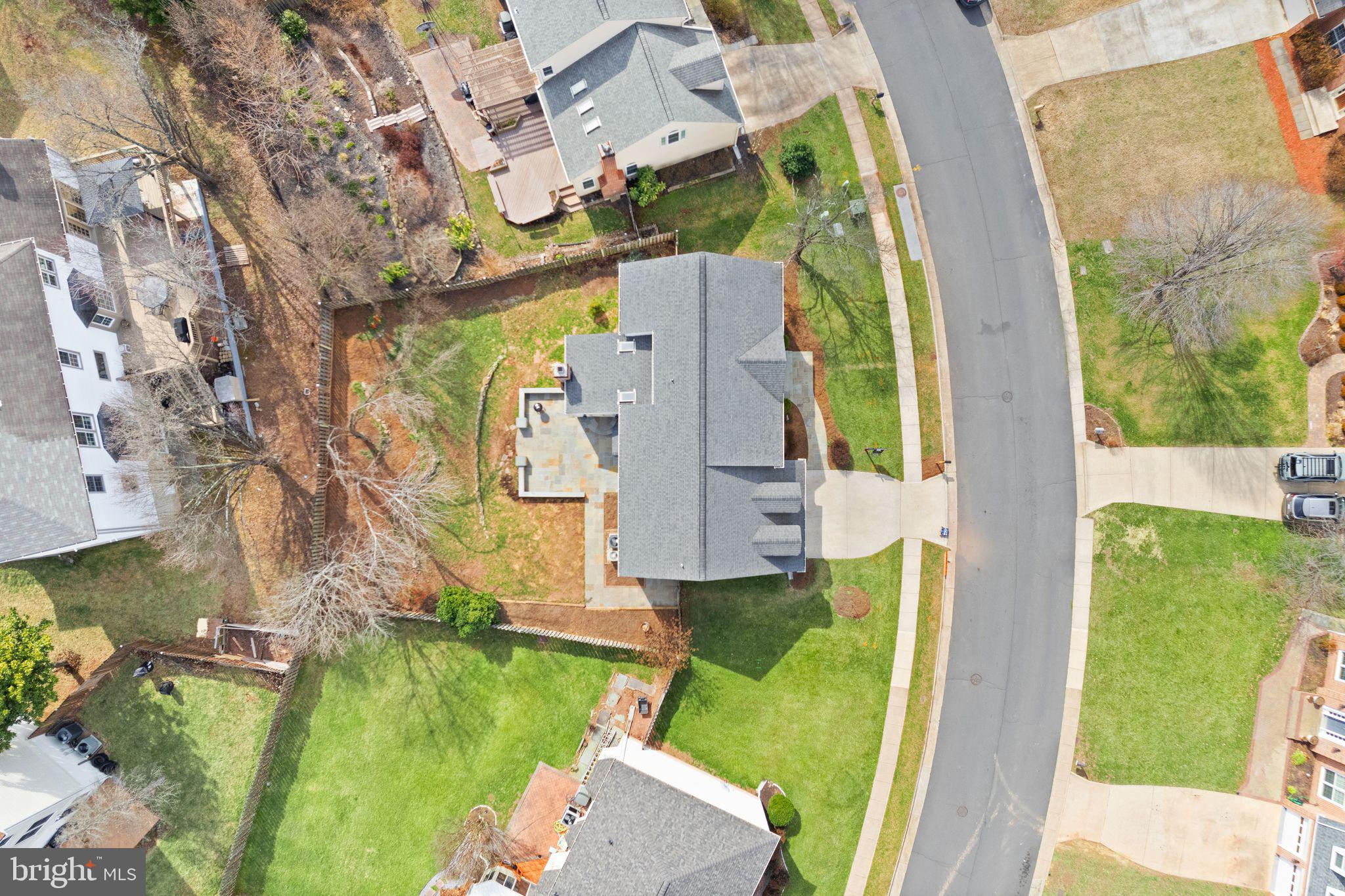 6833 Compton Heights Circle Clifton, VA 20124 - Photo 74 of 81 an aerial view of a house with garden space and a car park