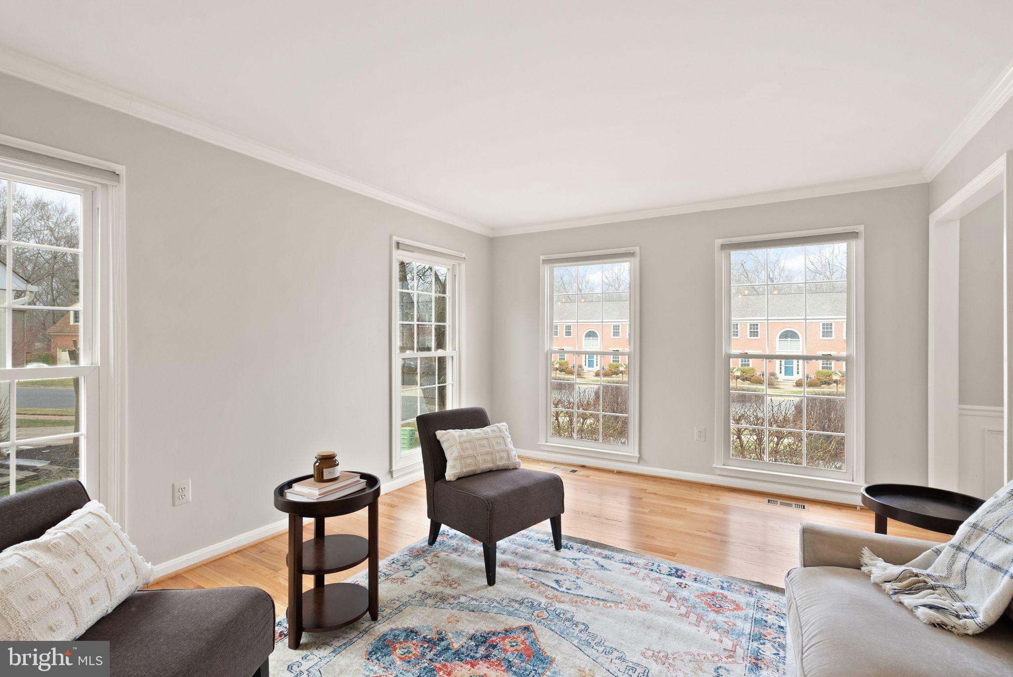6833 Compton Heights Circle Clifton, VA 20124 - Photo 10 of 81 a living room with furniture and a window