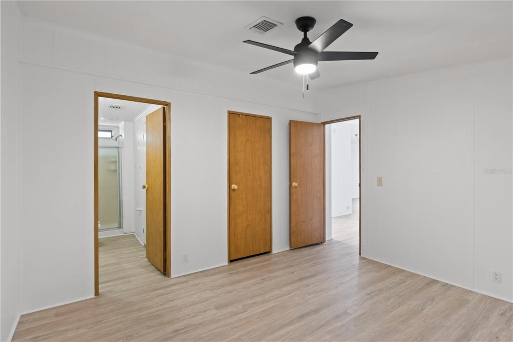 15550 Burnt Store Road, Unit 229 Punta Gorda, FL 33955 - Photo 16 of 40 a view of an empty room with a fan