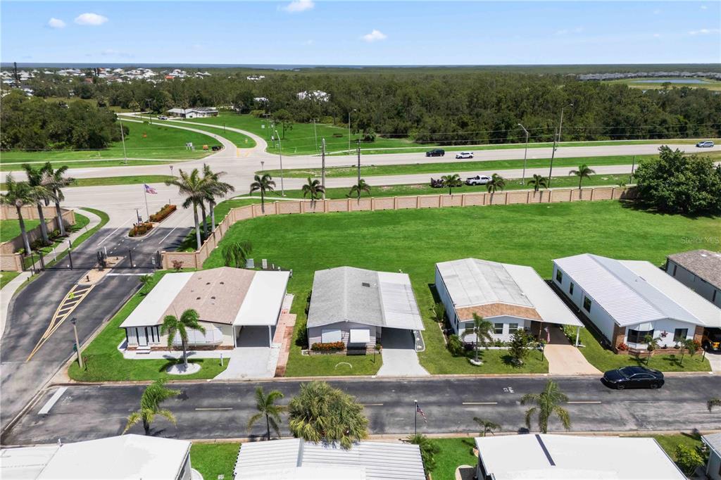 15550 Burnt Store Road, Unit 229 Punta Gorda, FL 33955 - Photo 26 of 40 an aerial view of a house with big yard