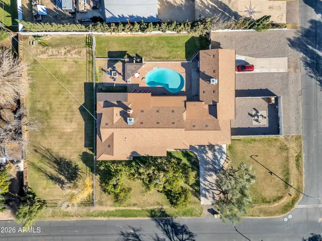 an aerial view of a house with a ocean view
