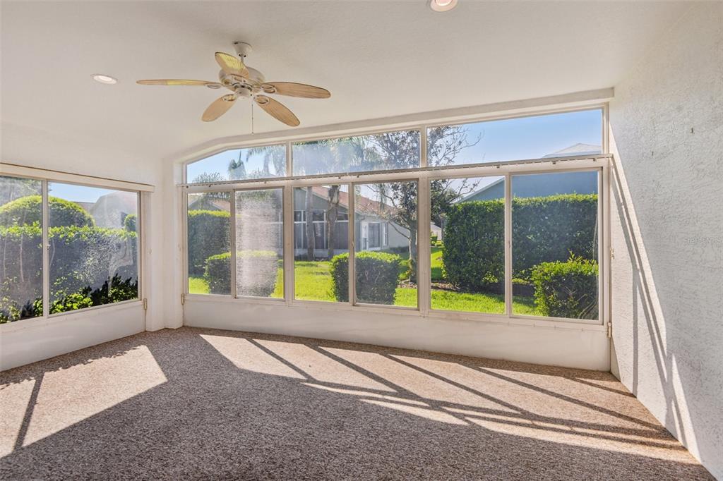 11705 Spindrift Loop Hudson, FL 34667 - Photo 20 of 34 a view of swimming pool with a porch