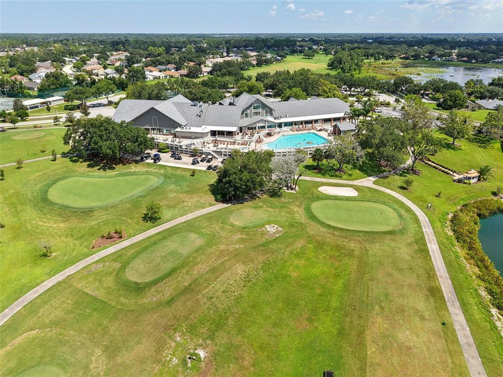 11705 Spindrift Loop Hudson, FL 34667 - Photo 32 of 34 an aerial view of residential houses with outdoor space