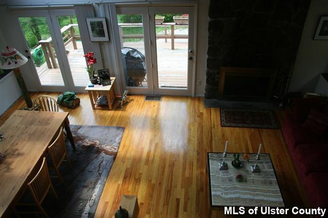 337 John Hewitt Road Roxbury, NY 12474 - Photo 12 of 17 view of a living room with furniture and a fireplace