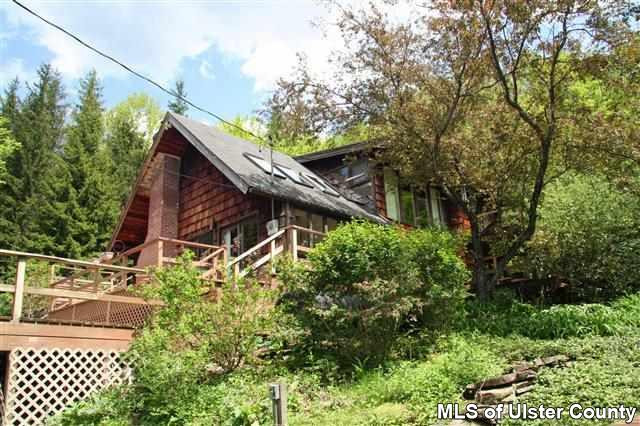 337 John Hewitt Road Roxbury, NY 12474 - Photo 2 of 17 a backyard of a house with lots of green space