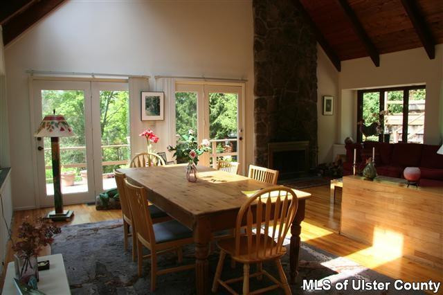 337 John Hewitt Road Roxbury, NY 12474 - Photo 5 of 17 a view of a dining room with furniture window and outside view