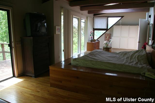 337 John Hewitt Road Roxbury, NY 12474 - Photo 8 of 17 a bedroom with a bed and a window