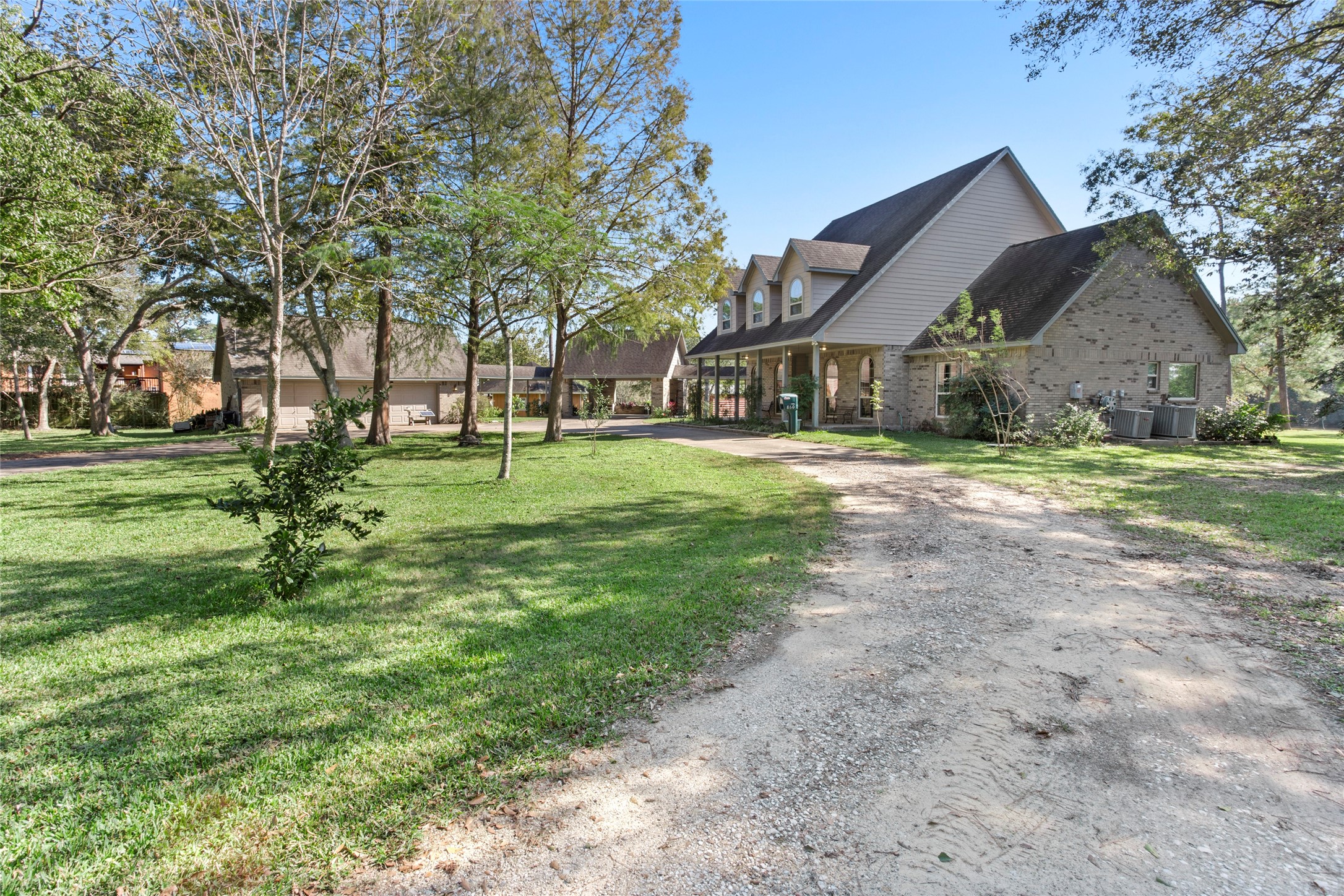 860 FM 517 Road East Dickinson, TX 77539 - Photo 11 of 50 a view of a house with a yard