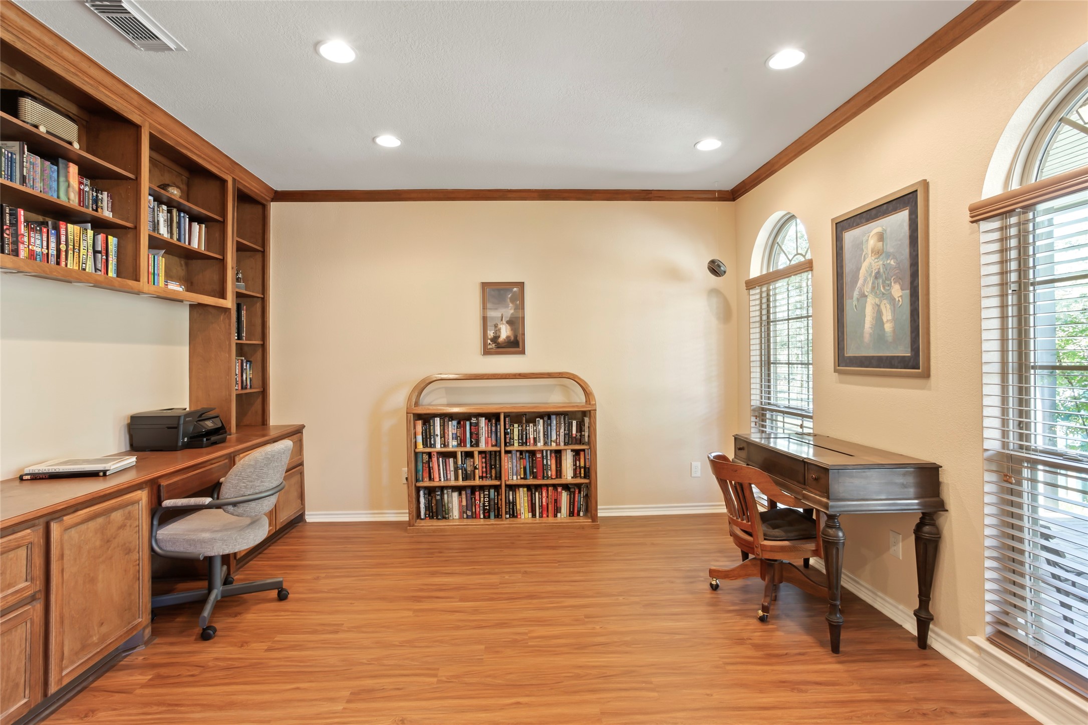 860 FM 517 Road East Dickinson, TX 77539 - Photo 15 of 50 a workspace with furniture hardwood and a window