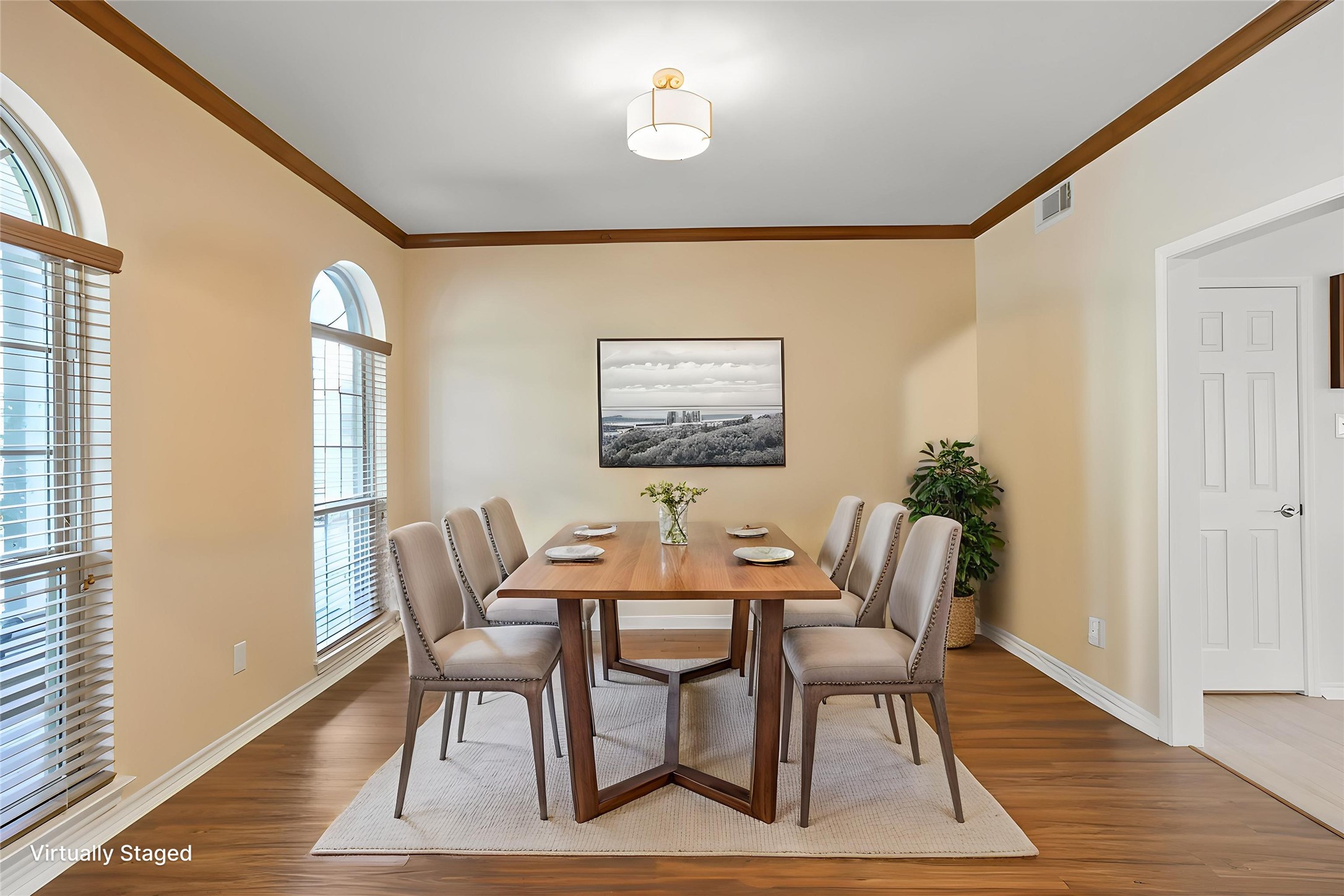 860 FM 517 Road East Dickinson, TX 77539 - Photo 16 of 50 a dining room with furniture and wooden floor