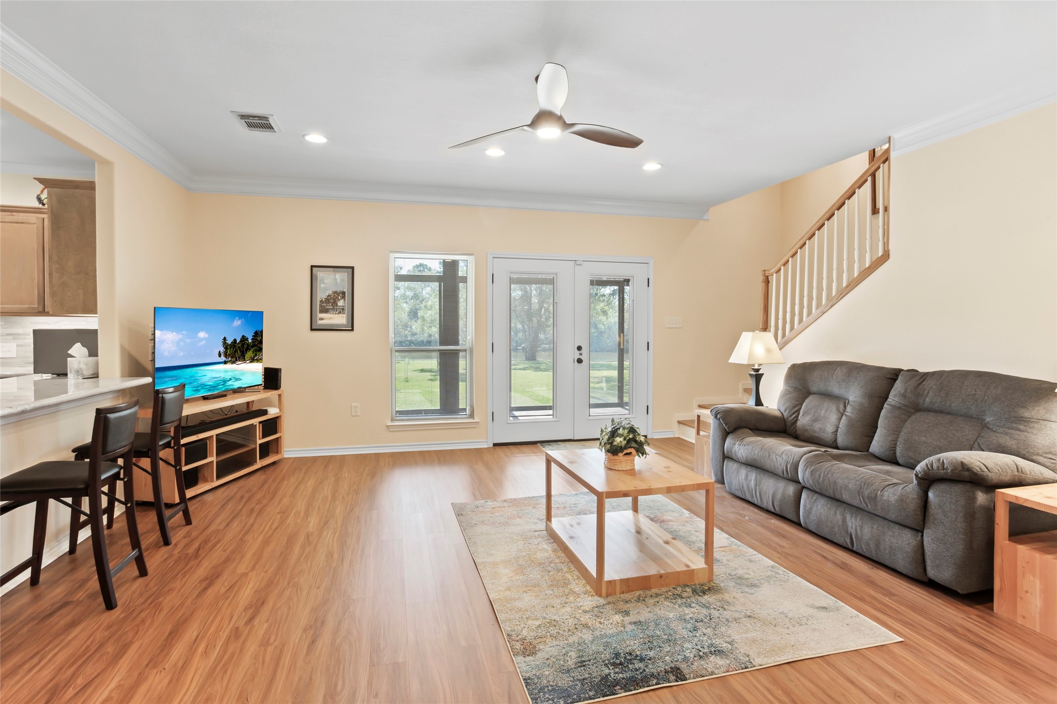 860 FM 517 Road East Dickinson, TX 77539 - Photo 19 of 50 a living room with furniture and a wooden floor