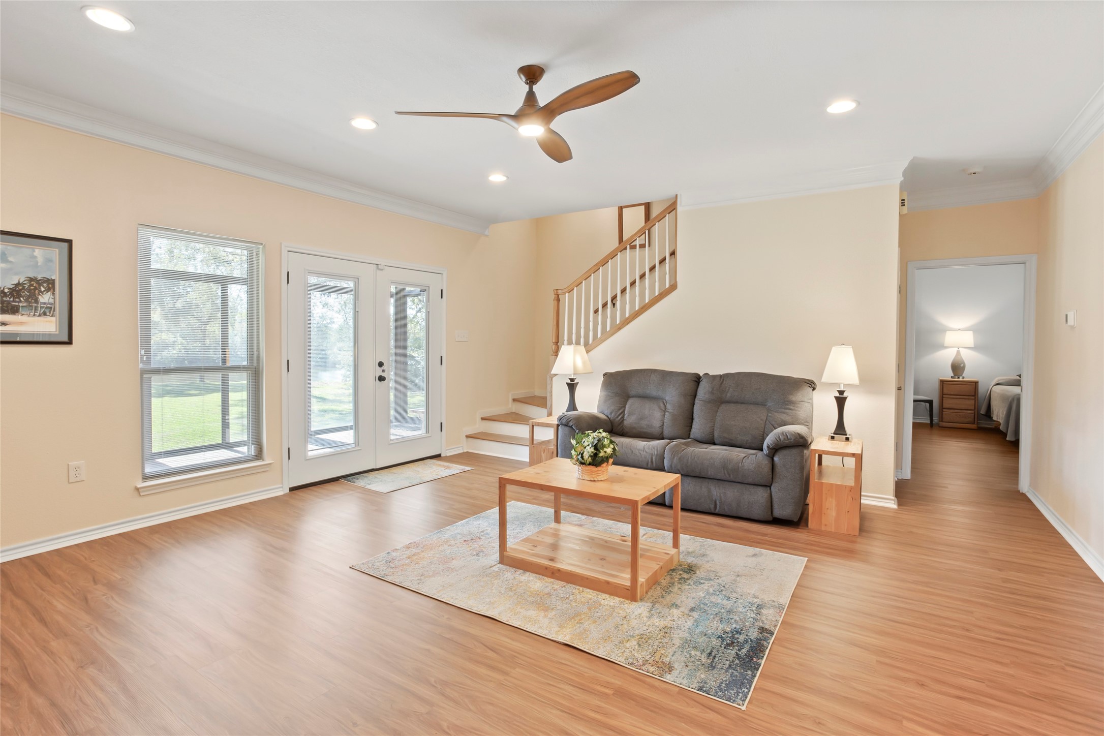 860 FM 517 Road East Dickinson, TX 77539 - Photo 20 of 50 a living room with furniture and a wooden floor