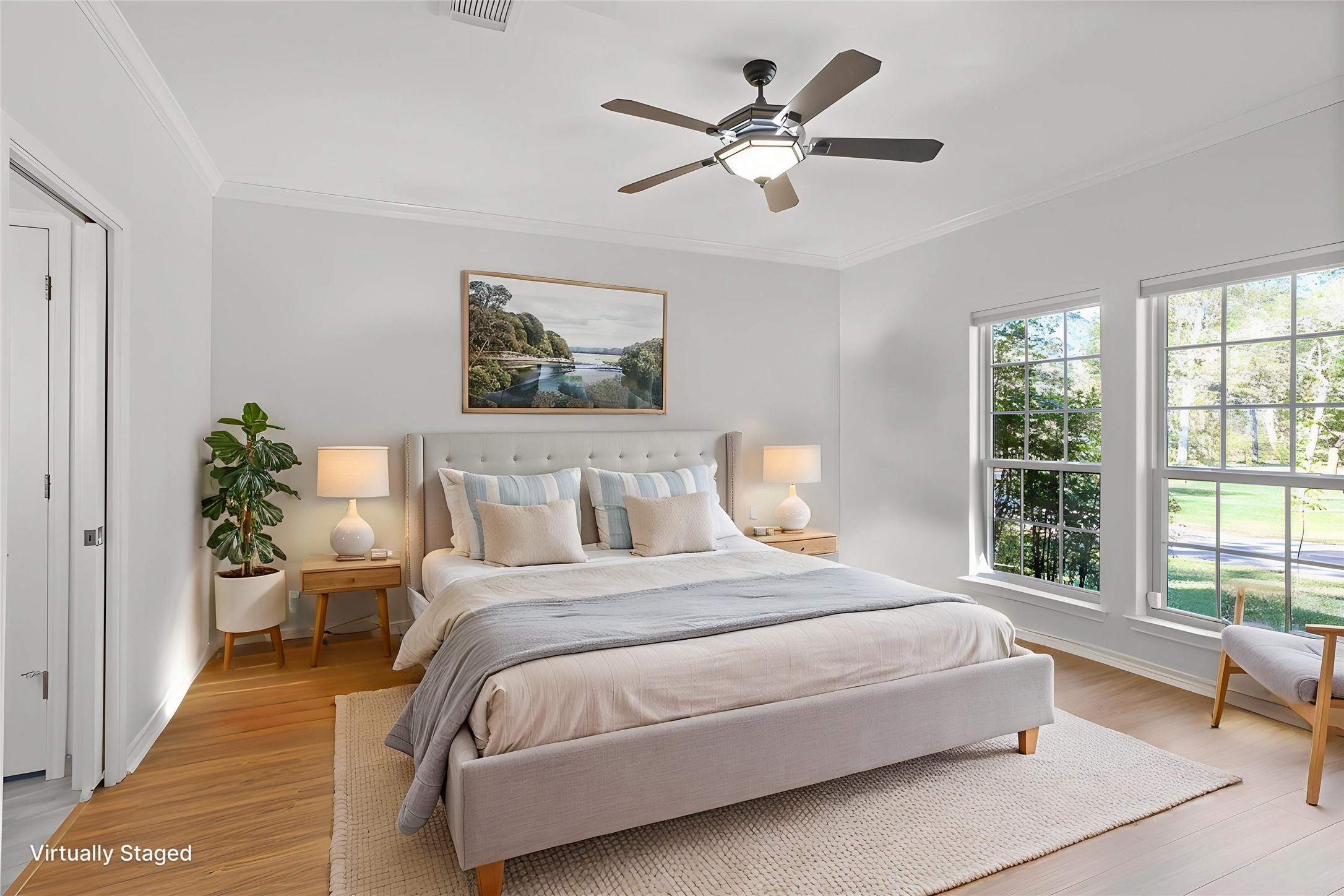 860 FM 517 Road East Dickinson, TX 77539 - Photo 27 of 50 a bedroom with a large bed and a window