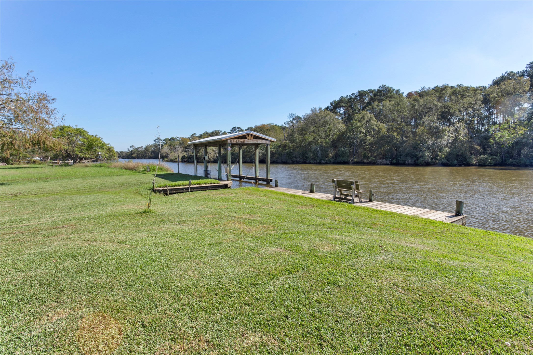 860 FM 517 Road East Dickinson, TX 77539 - Photo 3 of 50 a view of a swimming pool and an outdoor seating