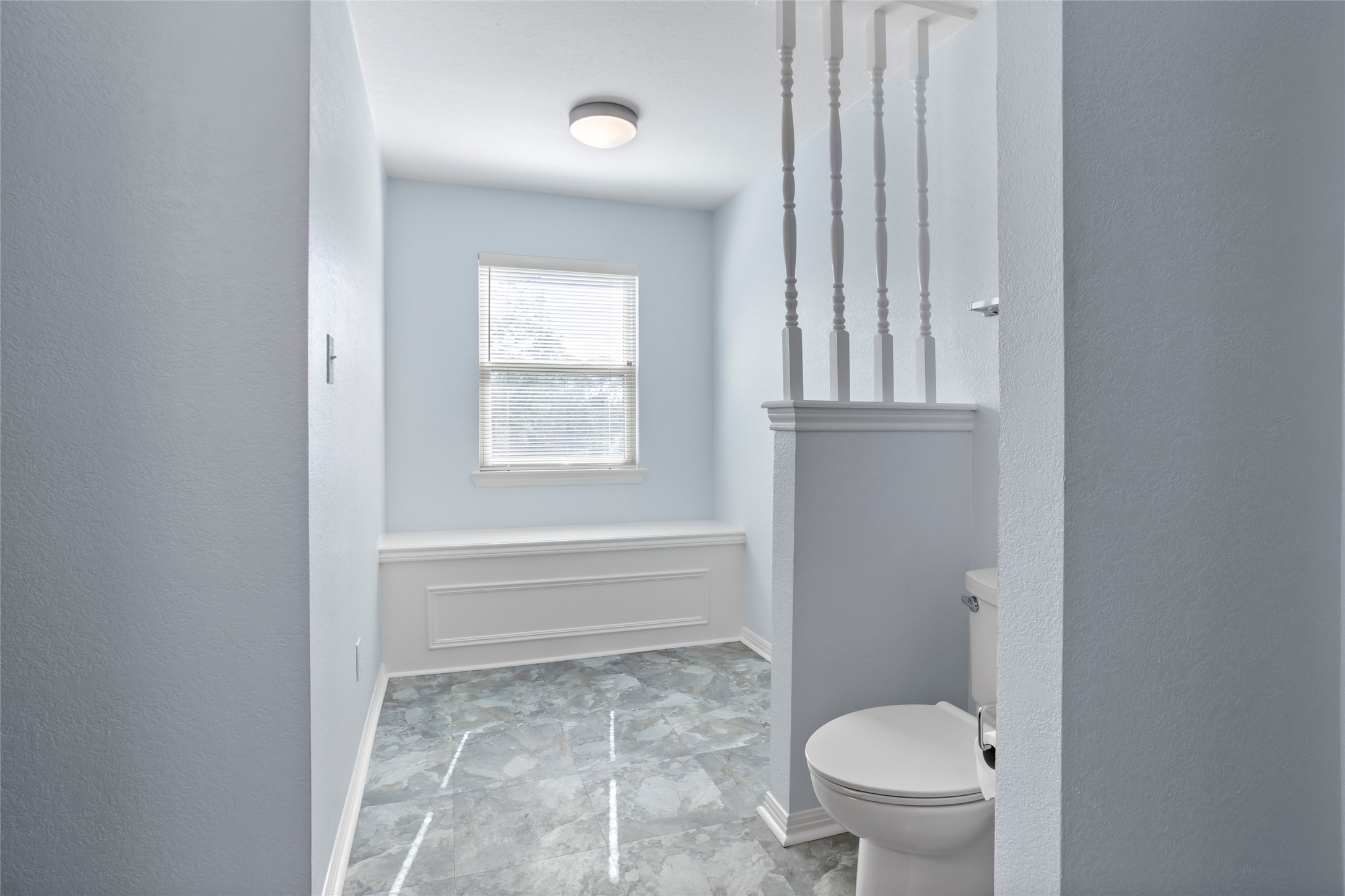 860 FM 517 Road East Dickinson, TX 77539 - Photo 36 of 50 a bathroom with a toilet a sink and a bathtub