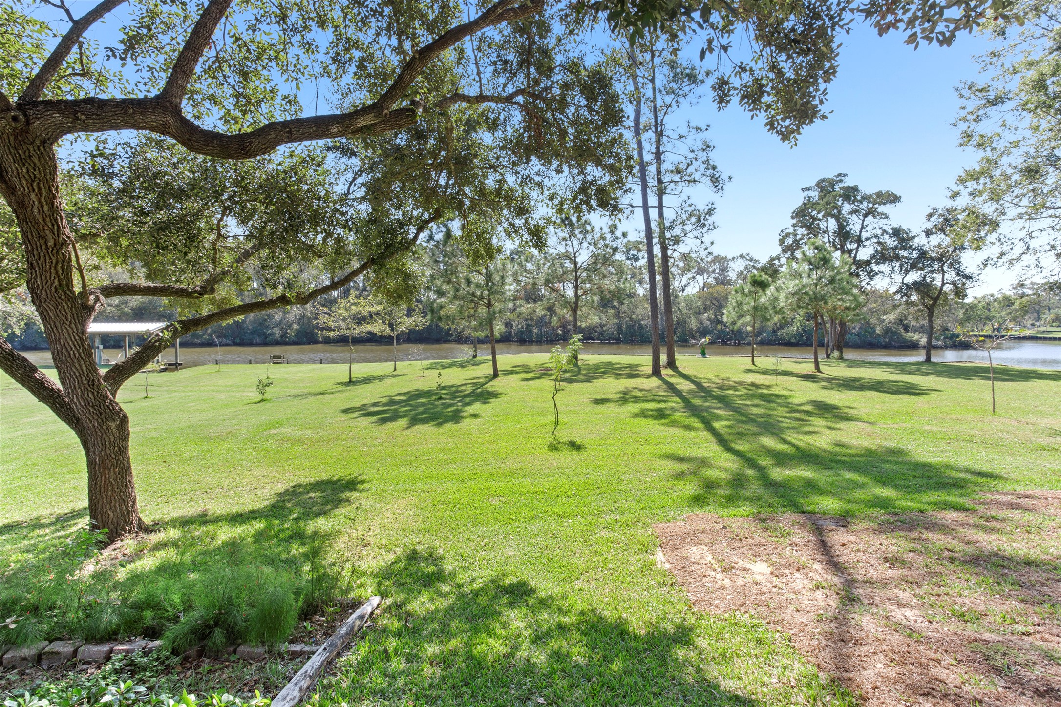 860 FM 517 Road East Dickinson, TX 77539 - Photo 4 of 50 a view of a park with large trees