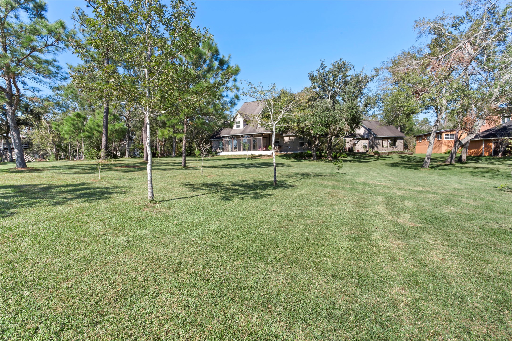 860 FM 517 Road East Dickinson, TX 77539 - Photo 5 of 50 a view of a park with large trees